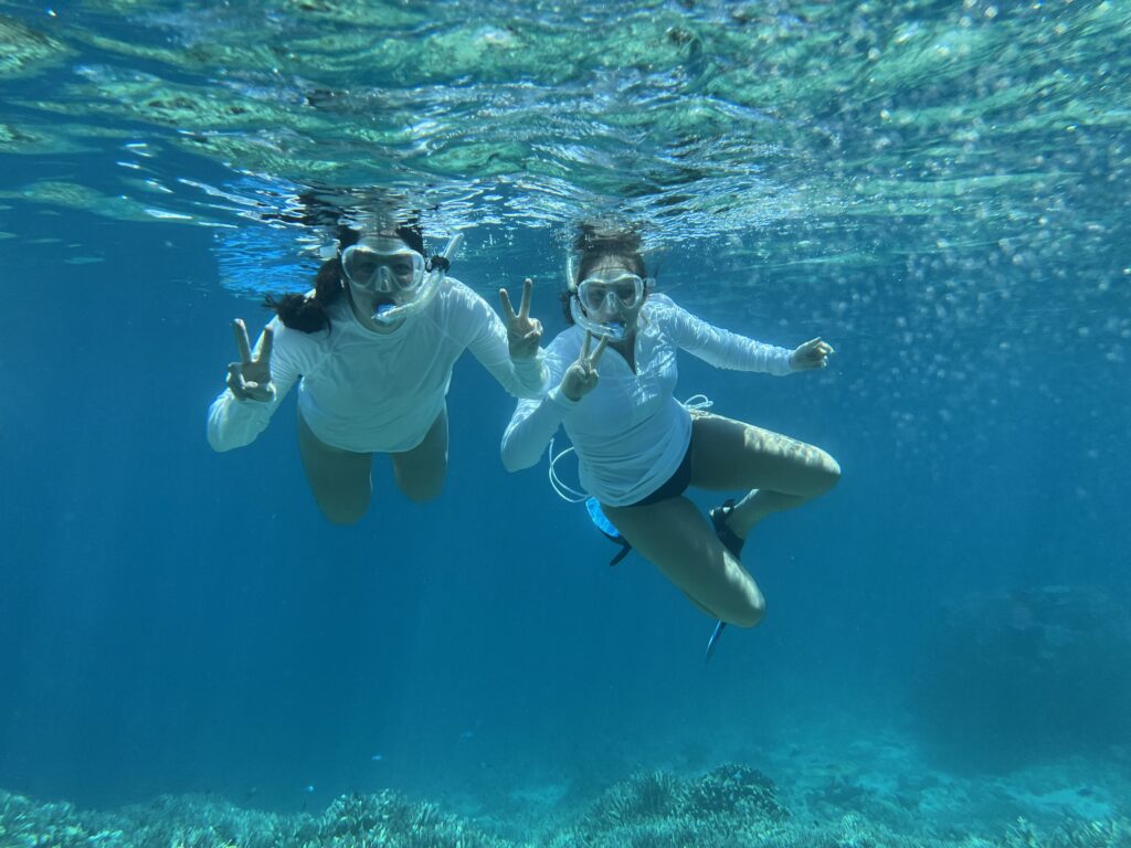 Ladies snorkelling in the clear blue ocean