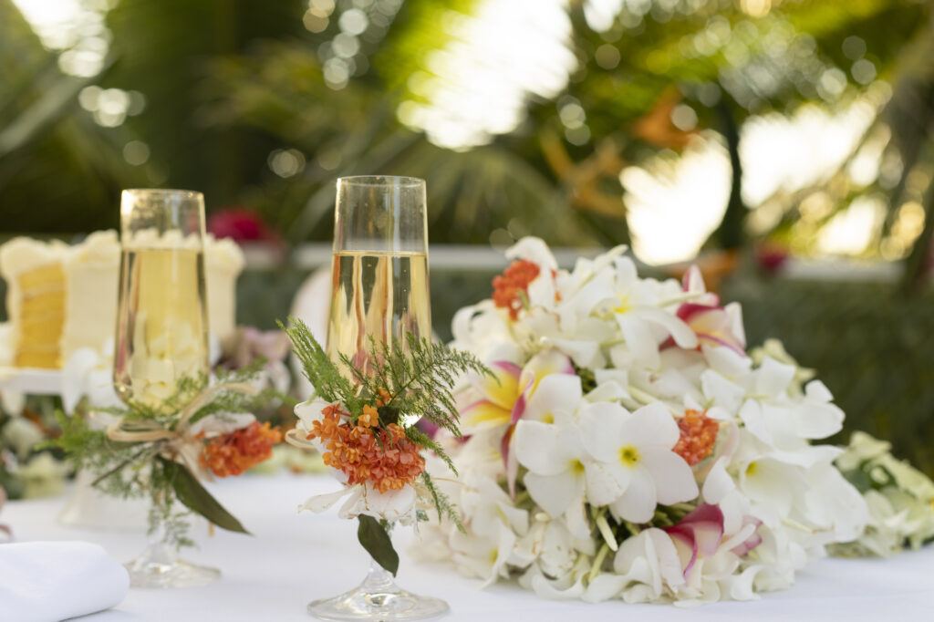 Two champagne glasses with floral arrangement Taveuni Palms Resort Fiji